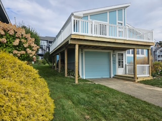 Upper deck with garage below