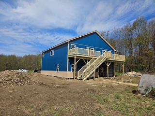 Blue pole barn rear view
