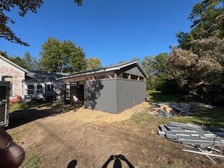 Pole barn construction with metal siding