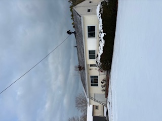 Crew working on residential roof