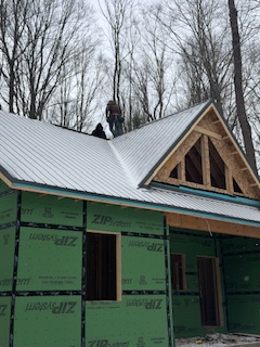 New construction metal roof installation